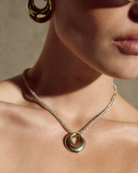The Mercury Disc Sparkle Necklace on model View 7