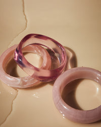 Flat lay photo of the Luv Aj Formentera bangles in pink View 4