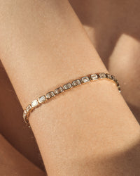 The Luv Aj Fine Emerald Bezel Tennis Bracelet on model View 3