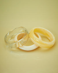 The Luv Aj Formentera Bangle Set in Yellow on yellow background View 4