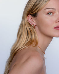 The Luv Aj Multi Piercing Huggies in Gold on Model View 3