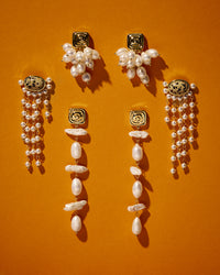 The Luv Aj Palma Pearl Studs on orange background View 6