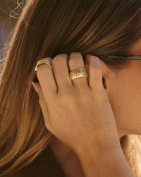 The Luv Aj Georgia Ridged Band in Gold on Models ring finger View 3