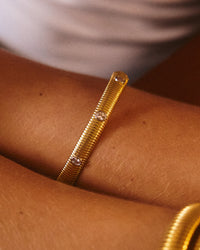 The Luv Aj Georgia Ridged Bangle in Gold on Model  View 2