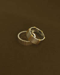 The Luv Aj Luna Bezel Ring Set in Silver on a brown background View 3