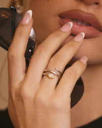 The Luv Aj Marais Coil Ring in Silver on Model's ring finger View 4
