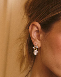 The Luv Aj Marais Drop Studs in Silver on Model's Ear View 2