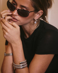 The Luv Aj Marais Drop Studs in Silver on Model  View 4