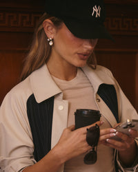 The Luv Aj Marais Hook Earring in Gold on Model  View 3