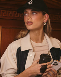 The Luv Aj Marais Hook Earring in Gold on Model View 4