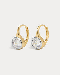 The Luv Aj Marais Hook Earrings in gold on white background View 1
