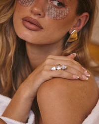 The Luv Aj Marais Triple Statement Ring in Gold on model View 4