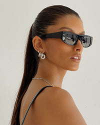 Luv Aj Pave Interlock Hoops in Silver on model View 6