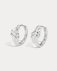 The Luv Aj Margaux Knot Hoops in silver on white background View 1