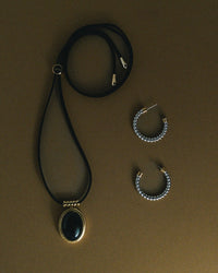 The Luv Aj Midnight Mesa Cord Necklace in Gold on flat background View 4