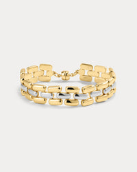 The Luv Aj Noir Link Bracelet in Gold on white background View 1