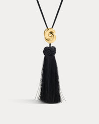 The Luv Aj Solstice Knot Tassel Necklace in Gold on White Background View 1