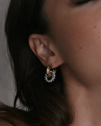 The Luv Aj Two-Tone Rope Interlock hoops in gold on model  View 2