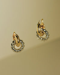 The Luv Aj Two-Tone Rope Interlock Hoops in Gold on green background View 2