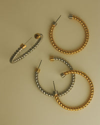 Flat lay photo of the Luv Aj XL Sierra Rope Hoops in Gold and Silver View 3