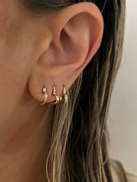 The That’s Amore Huggies are the middle earrings View 9