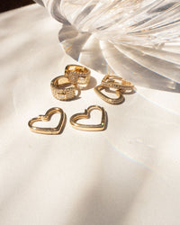 The That’s Amore Huggies are the earrings on the bottom left View 4