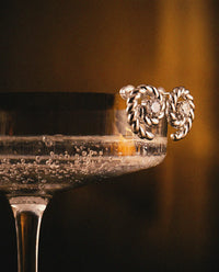 Luv Aj Charlotte Coil Studs in Silver, flat lay View 3