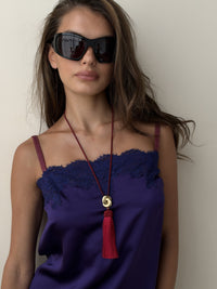 Luv Aj The Solstice Knot Tassel Necklace in Ruby, on model View 5