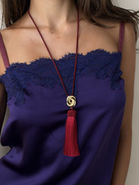 Luv Aj The Solstice Knot Tassel Necklace in Ruby, on model View 3
