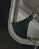 Luv Aj The Solstice Knot Tassel Necklace in Emerald, flat lay video