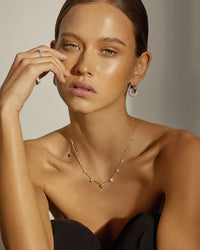 Luv Aj Pave Interlock Hoops in Silver on model View 3