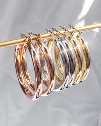 LV gold hoops – alluresjewelry